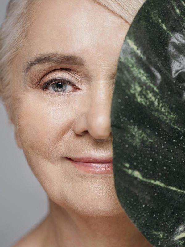 close-up-woman-holding-leaf
